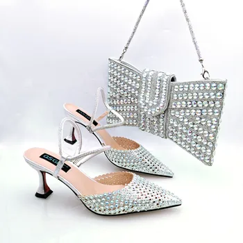 Лято 2023, Много добре продавания комплект сребърни обувки и чанти в Нигерия, предназначени за елитни партита и сватби, се продава добре в Африка